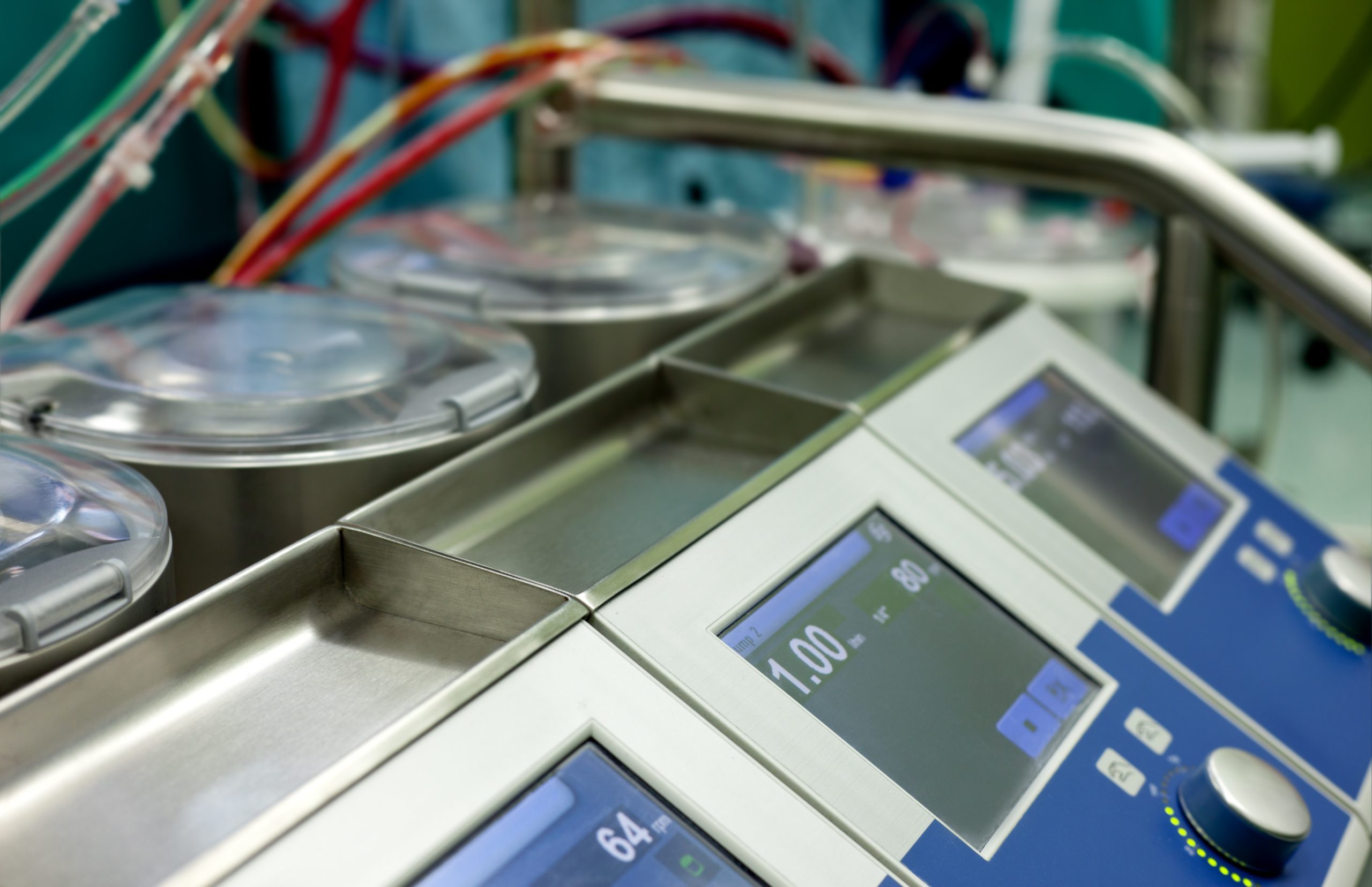 Digital perfusion system with touchscreen controls and blood pump monitors—supporting surgical precision and control.