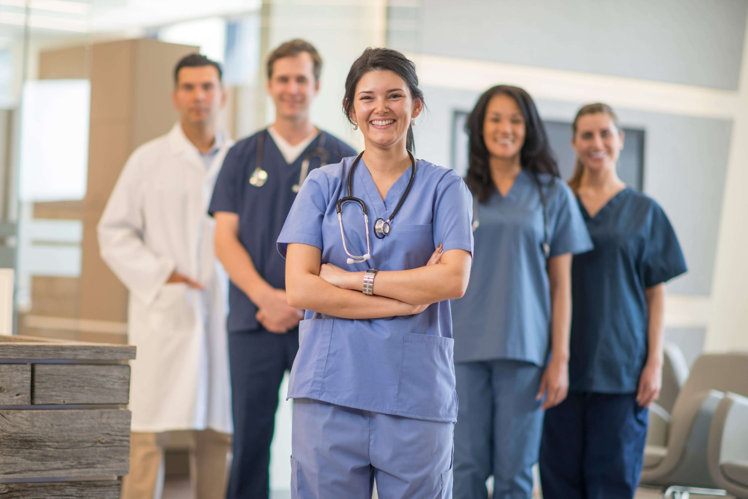A confident ECMO clinician standing front and center with the care team—ready to lead, support, and deliver when it matters most.